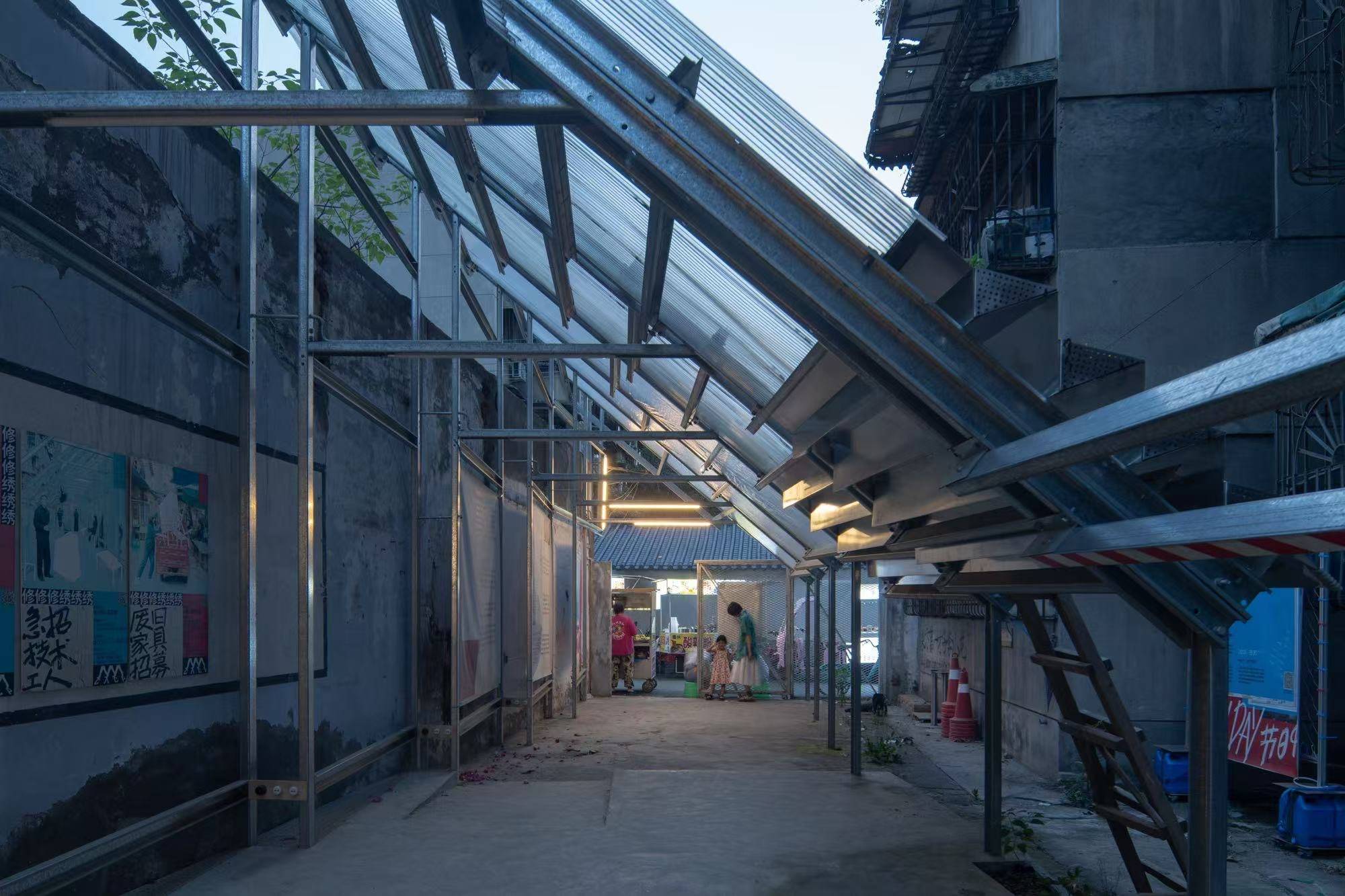 废车棚曾租住打工者 改成花园获设计金奖