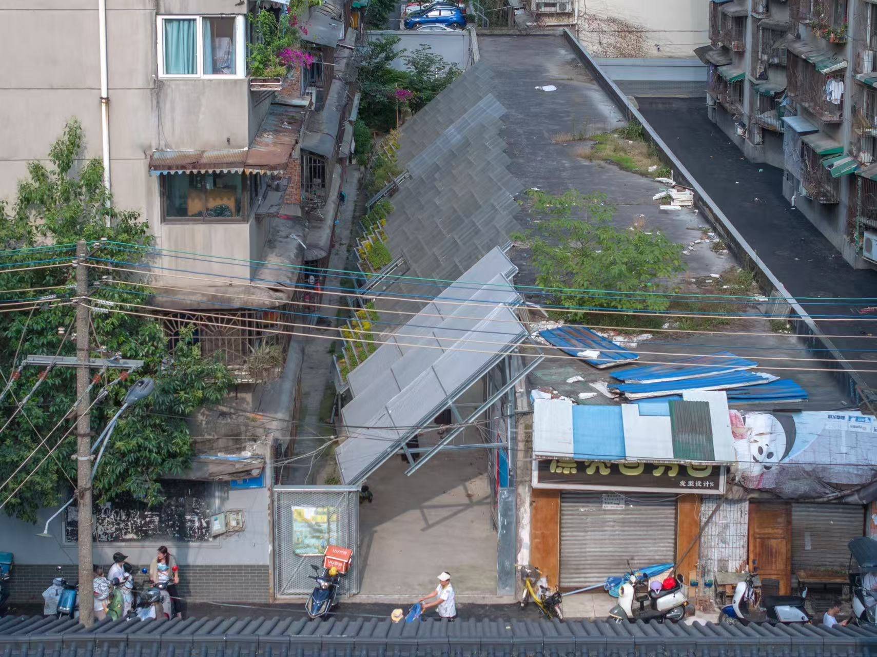 废车棚曾租住打工者 改成花园获设计金奖